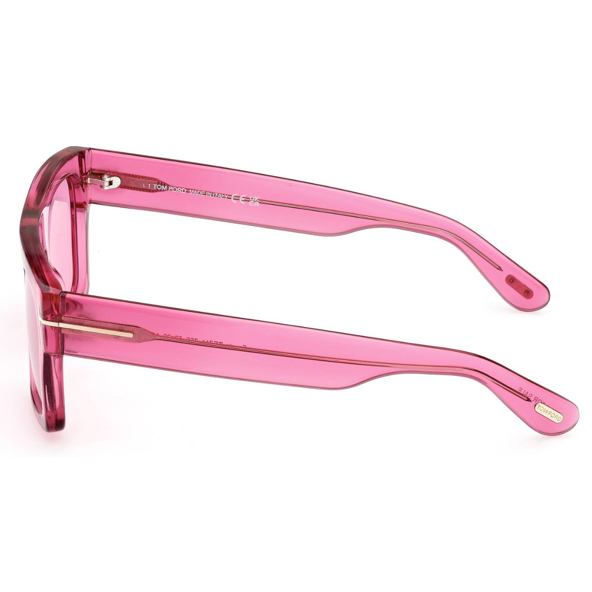 "Lifestyle image of a model wearing Tom Ford 711 sunglasses with a square red frame and light pink lenses, effortlessly complementing a chic outdoor ensemble."