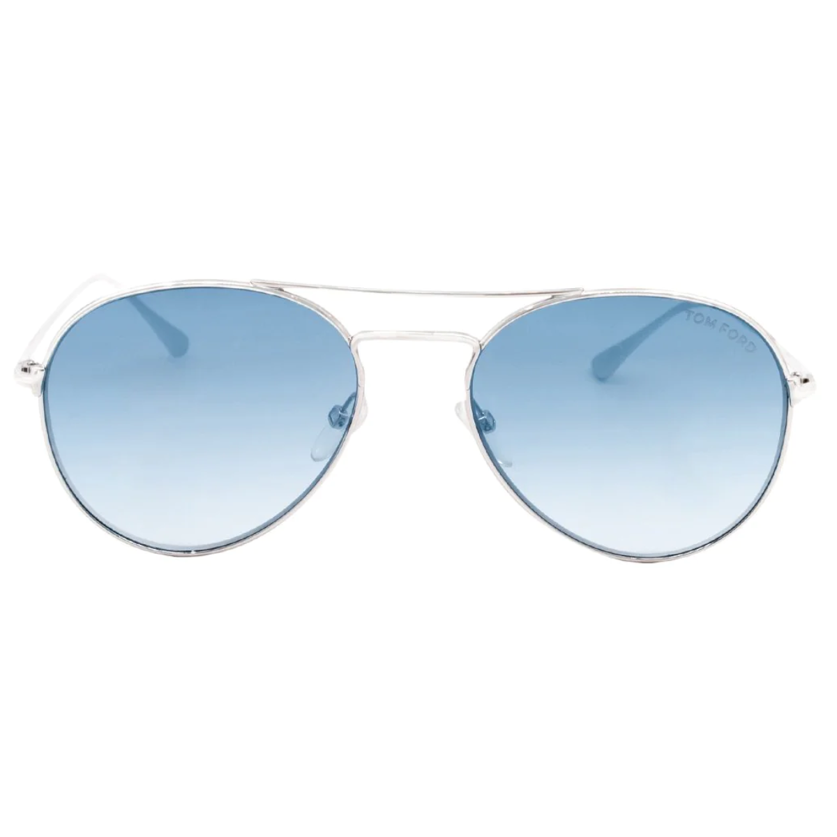 "Tom Ford 551 sunglasses for women displayed, featuring a metal frame in silver, aviator shape, and blue gradient non-polarized lenses, embodying elegance and luxury."