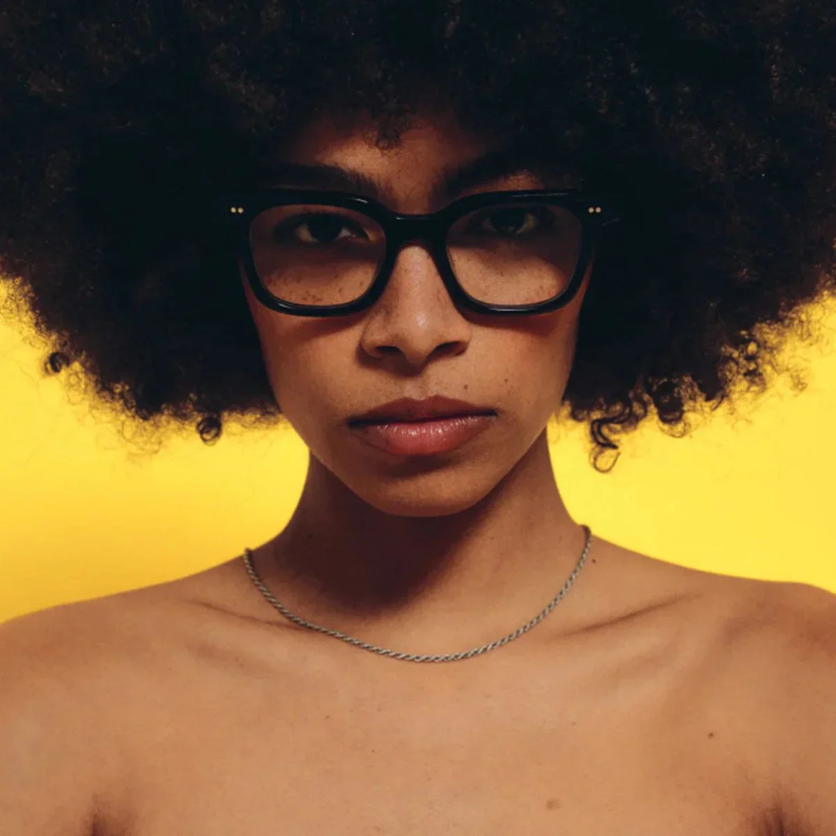 Modern Akila eyewear square frame in sleek black acetate, durable unisex optical design combining fashion, comfort, and premium craftsmanship optorium