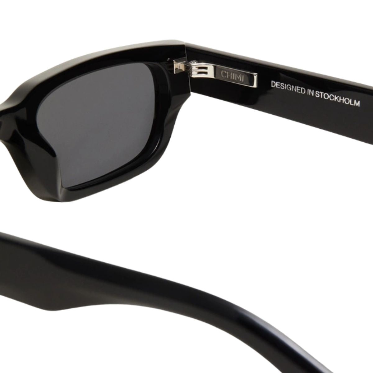 "Stay stylish with Chimi Core 10 black sunglasses, lightweight and perfect for any event, on Optorium."