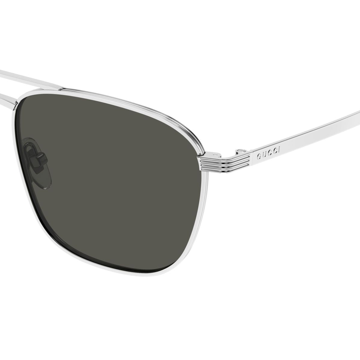 Discover Gucci's GG1881S 001 aviator sunglasses for men in silver, blending style and comfort effortlessly. Buy online at Optorium.
