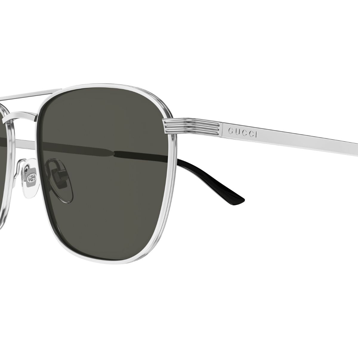 Gucci silver aviator sunglasses crafted with precision and featuring top-notch UV protection. Shop now online at Optorium.