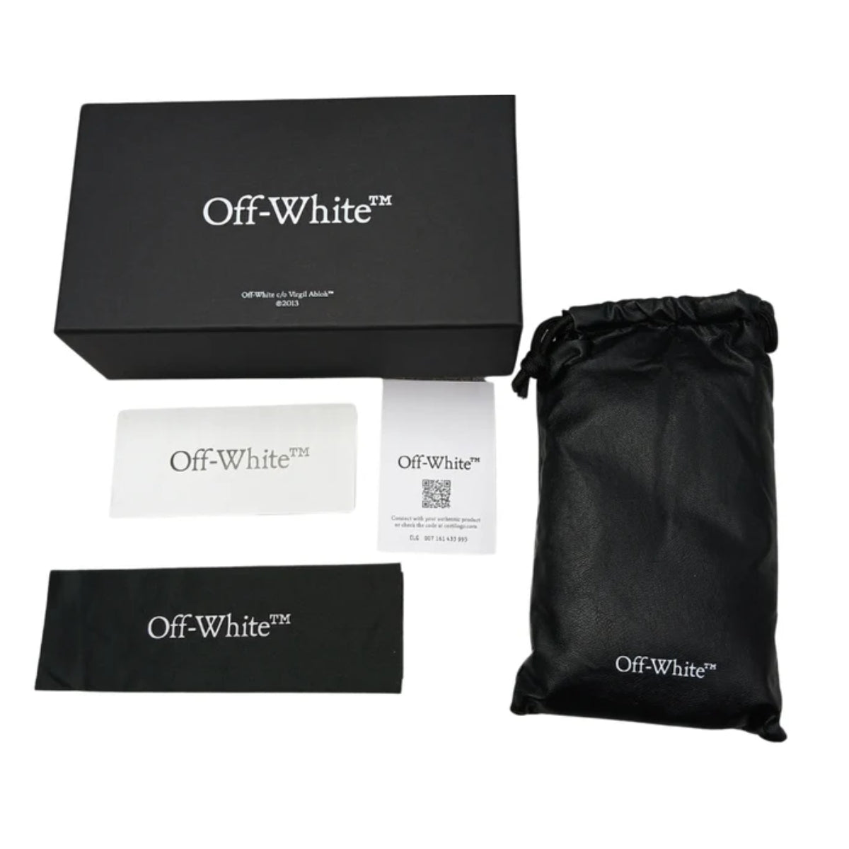 Off-White packaging set including a box, drawstring bag, card, and pouch on a white background.