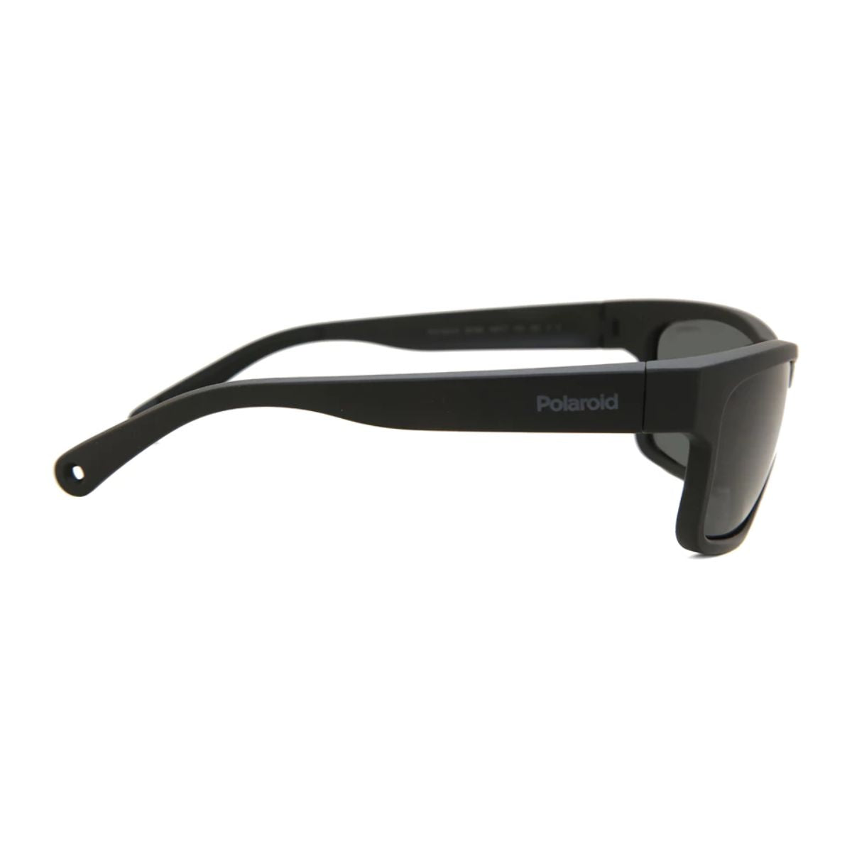 Outdoor shot of a male sporting Polaroid PLD-7031/S 807M9 polarised sunglasses with rectangular frames, highlighting stylish look and UV defense, Optorium.