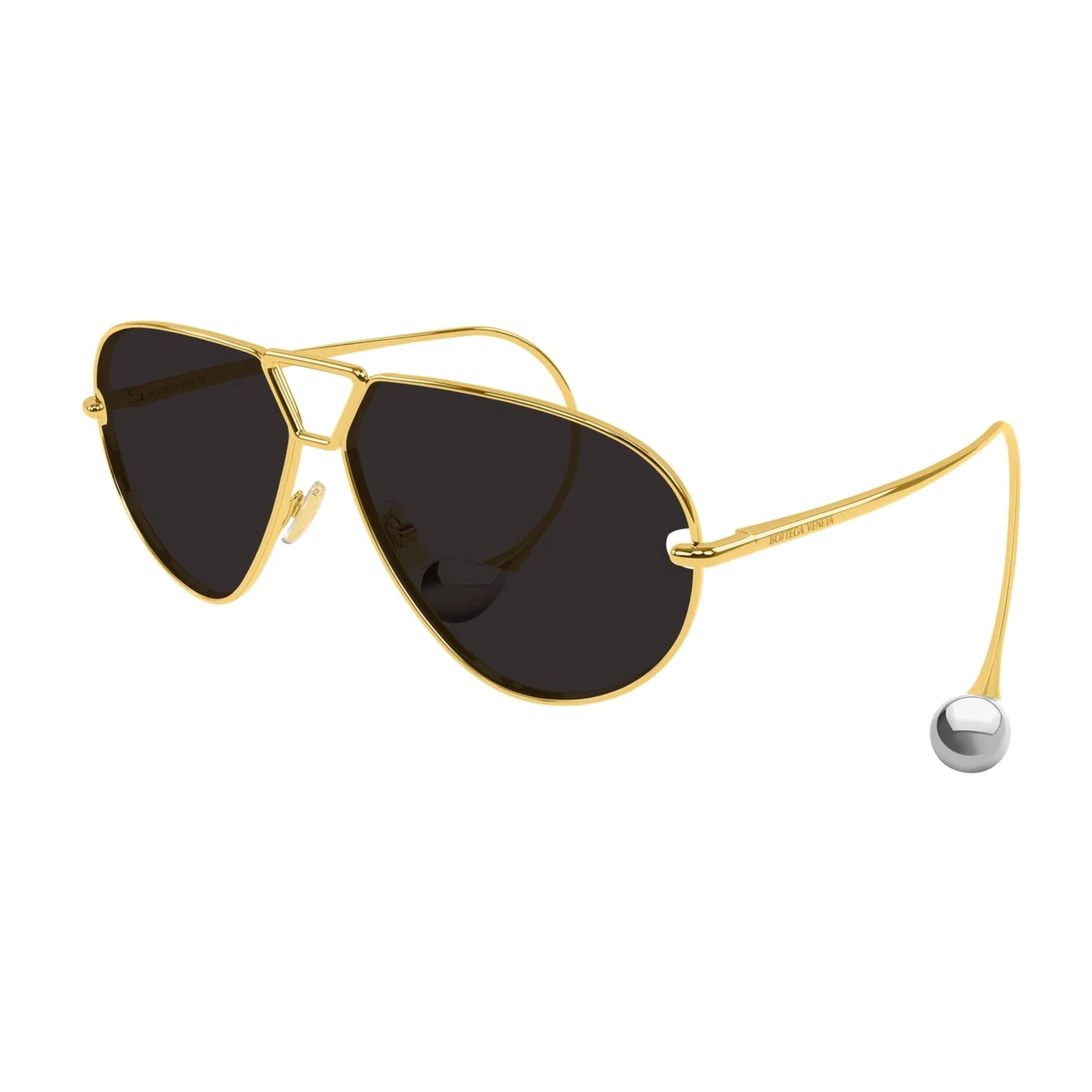 Explore Bottega Veneta BV1437S 001 women’s sunglasses with grey UV lenses