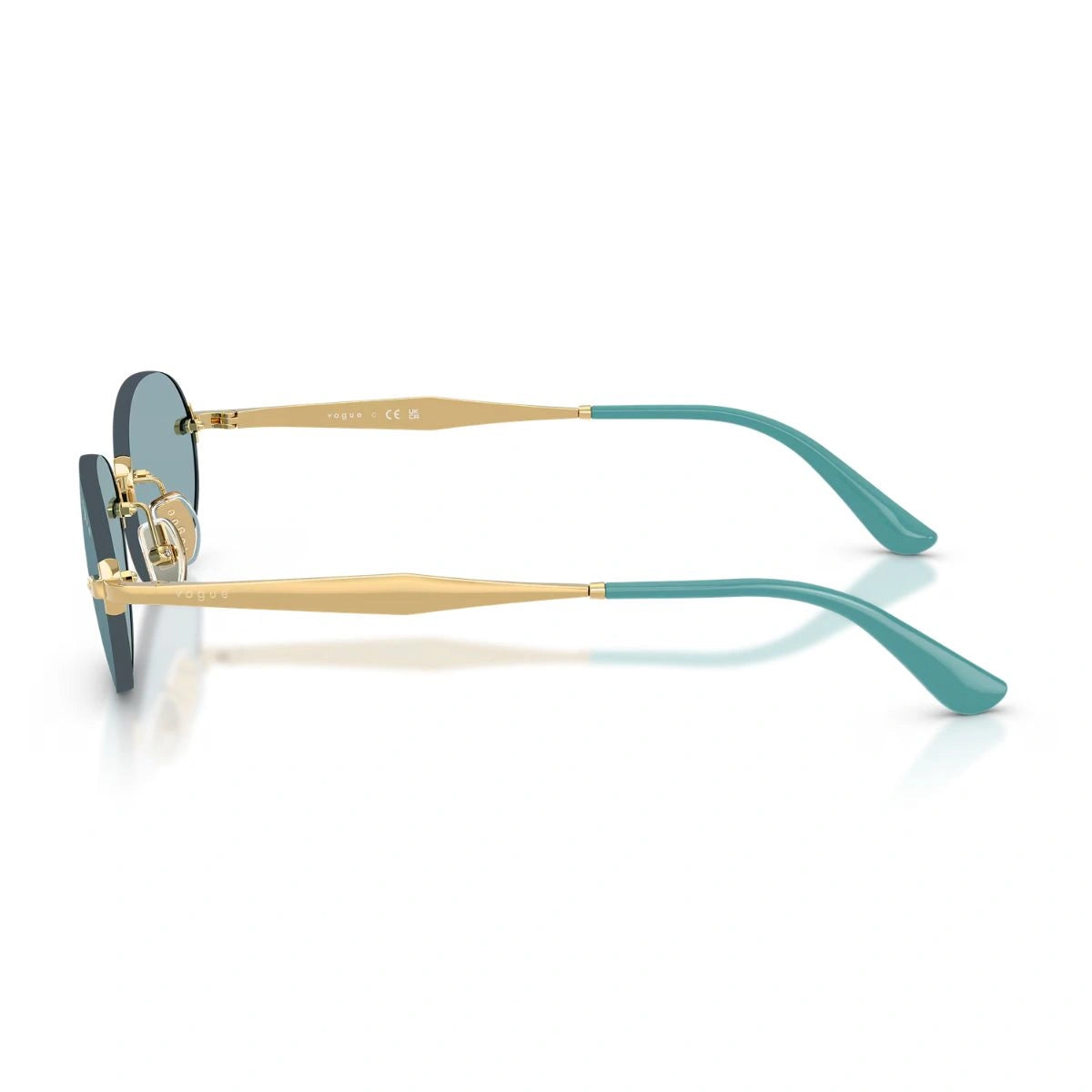 Authentic Vogue eyewear with blue lenses and gold temples