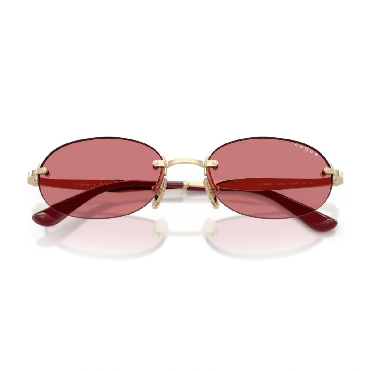 Stylish Vogue sunglasses for women with gold and red accents