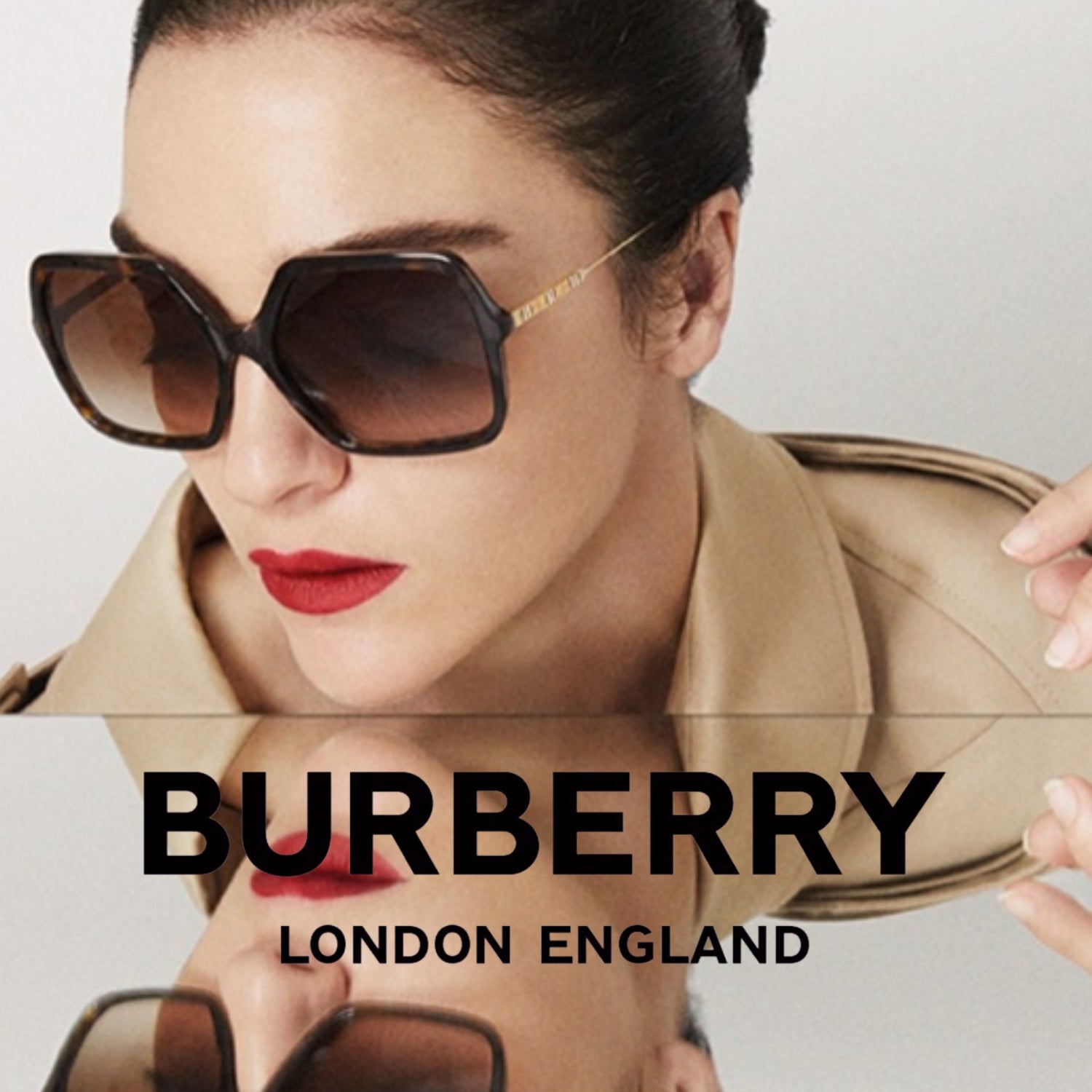 "A stylish woman & women wearing Burberry London England sunglasses, showcasing the brand's luxury and premium quality."