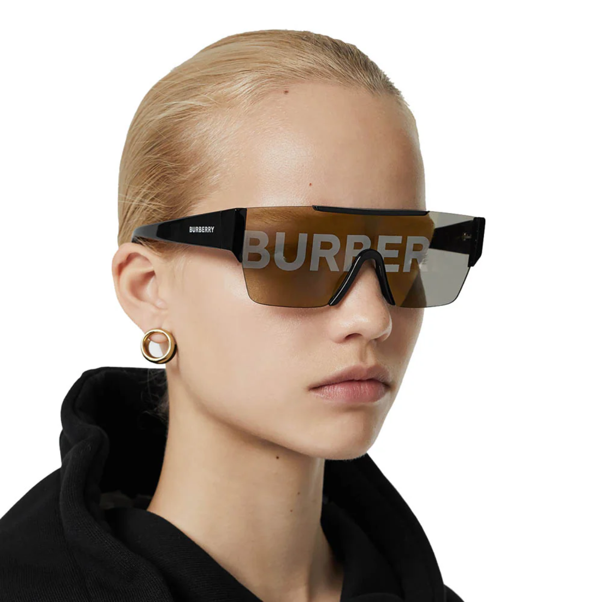 "Women Wearing Burberry UV Protection sunglass at Optorium"