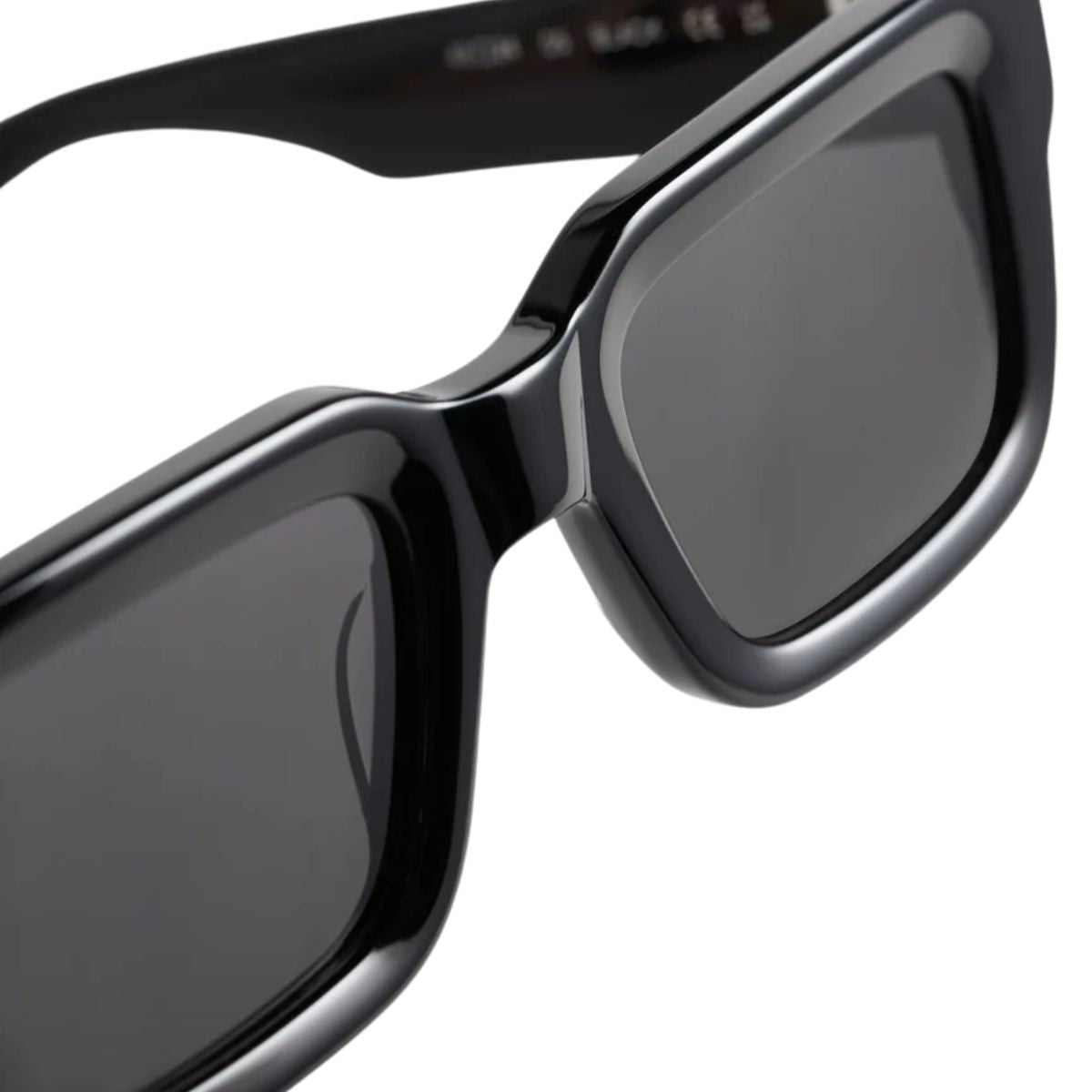 "Lightweight Chimi 05 black rectangle shades perfect for daily wear, available at Optorium."