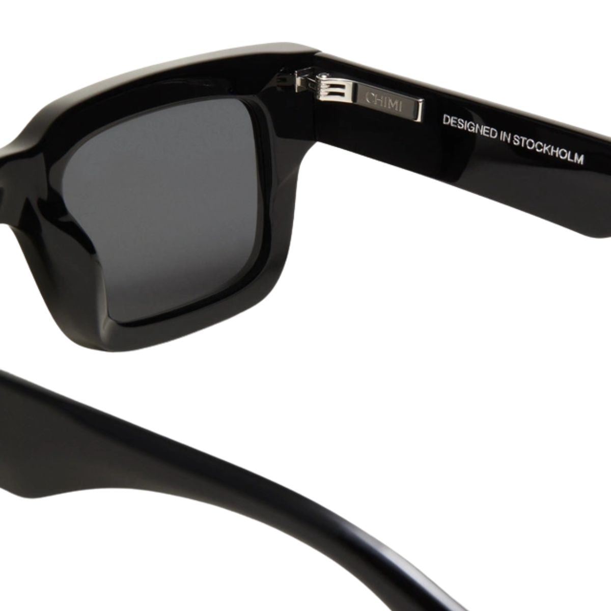 "Elevate your style with Chimi 05 black rectangle sunglasses, ideal for sunny days, on Optorium."