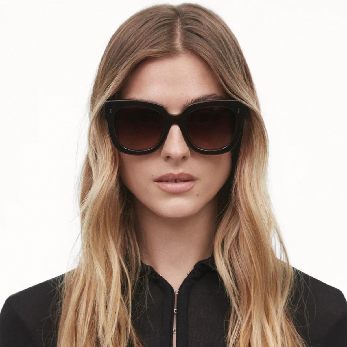 "Chimi 08 brown square sunglasses blend comfort and chic design, available at Optorium."