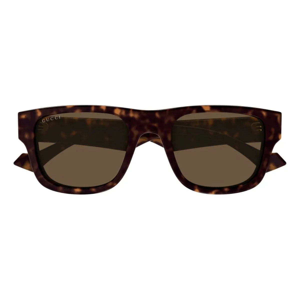 Tortoiseshell sunglasses with dark lenses on a white background