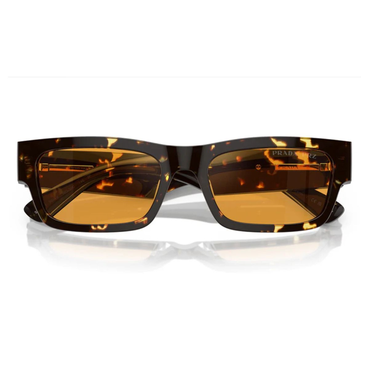 "Prada sunglasses with UV protection, Havana black frame, yellow lenses.at Optorium"