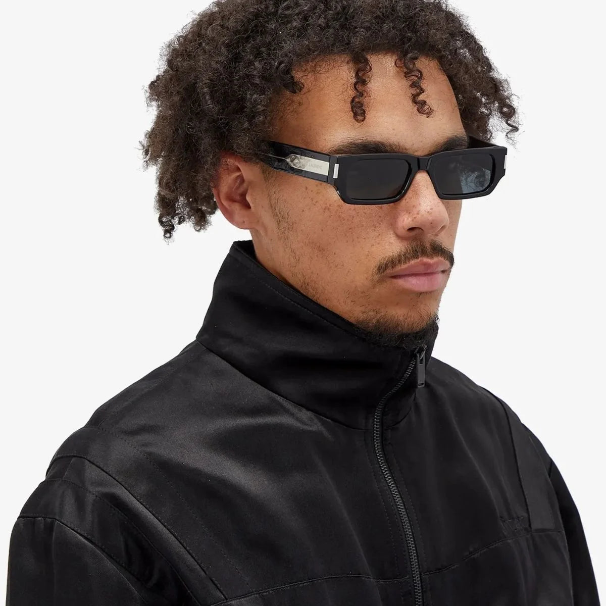 Buy Saint Laurent SL 660 001 black rectangle sunglasses with UV protection. Trendy YSL sunglasses for men & women with refined finish at Optorium.