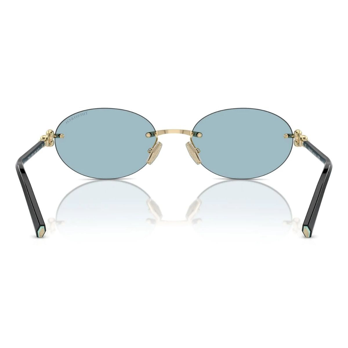 "Tiffany & Co TF 3104-D 6021/80 rimless sunglasses with black/gold frame and UV protection."