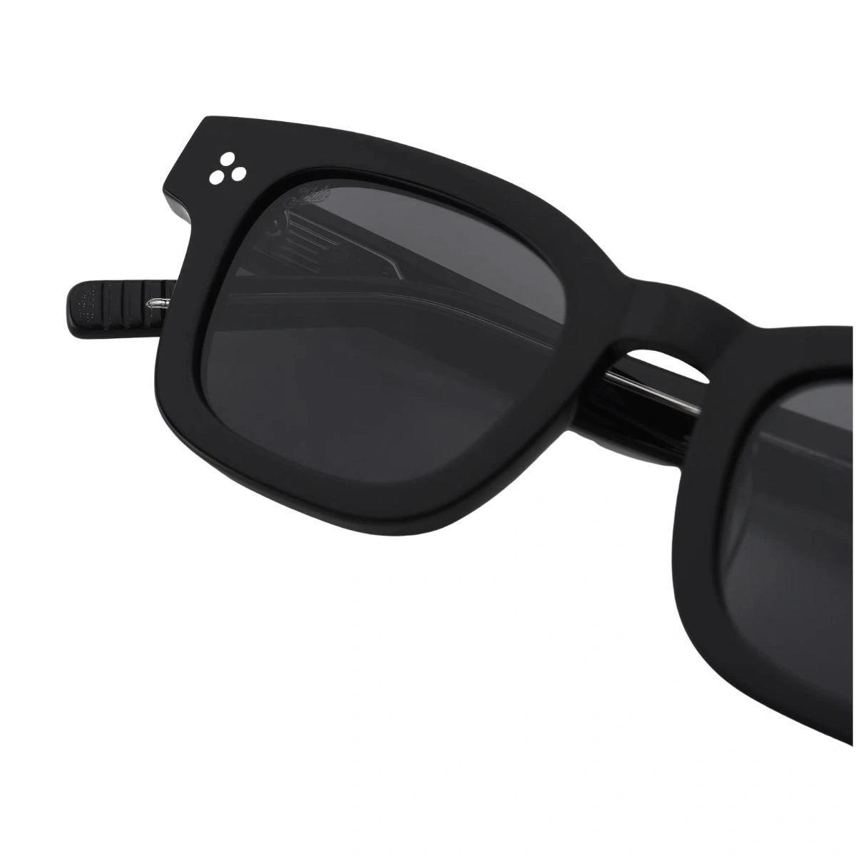 AKILA Ascent black sunglasses with custom-engraved sunburst temple cores