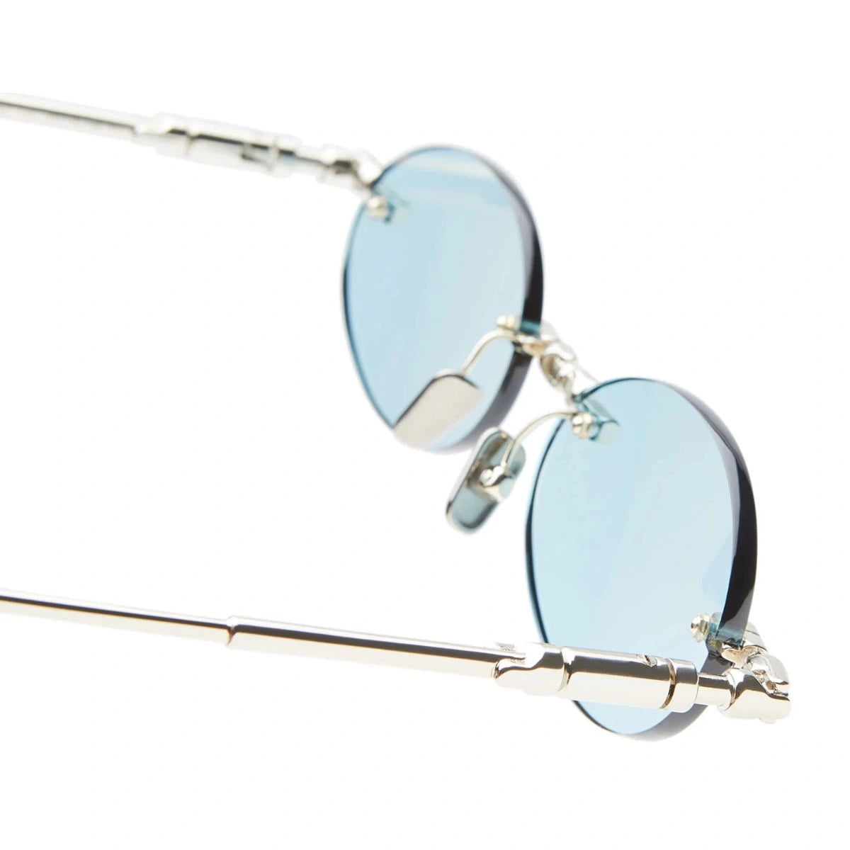 Luxury Kuboraum oval sunglasses with light blue scratch resistant lenses