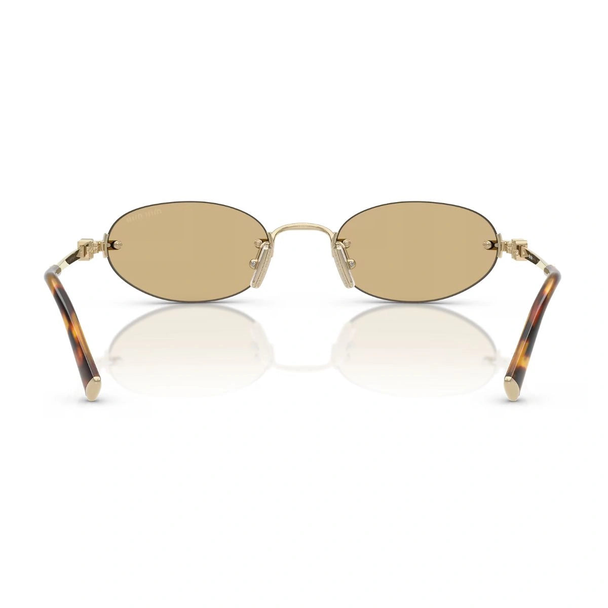 Close view of Miu Miu rimless sunglasses and tortoise temples