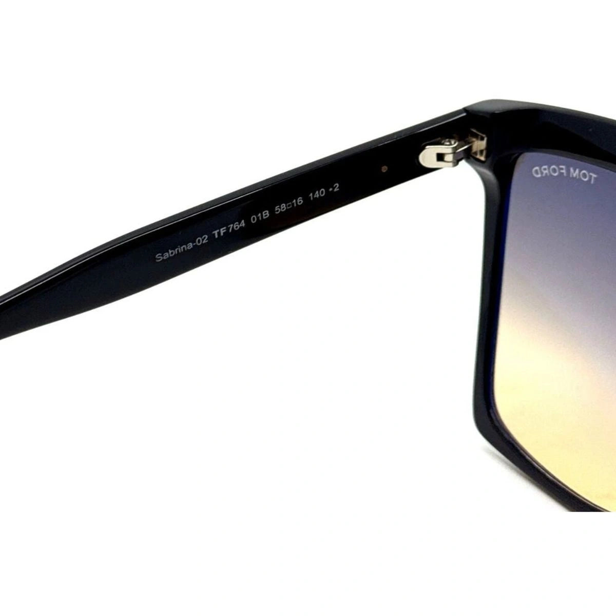 Elegant TOM FORD TF764 01B women's sunglasses with grey gradient lenses